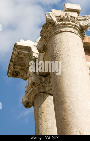 Eight surviving Doric columns of the Temple of Saturn on the Roman Forum in Rome Italy Stock Photo