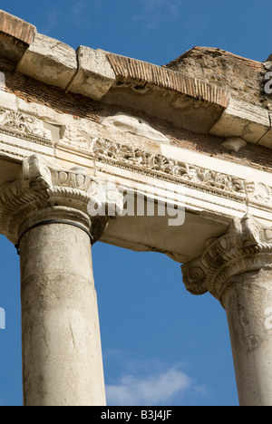 Eight surviving Doric columns of the Temple of Saturn on the Roman Forum in Rome Italy Stock Photo