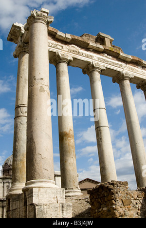 Eight surviving Doric columns of the Temple of Saturn on the Roman Forum in Rome Italy Stock Photo