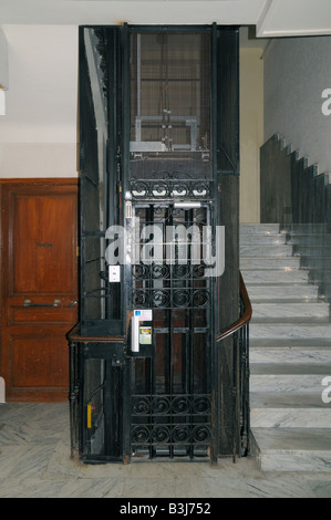 An old fashioned elevator in an apartment building in Nice on the Cote d Azur southern France Stock Photo