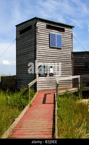 Bird Hide with Solar Panels at Newtown Estuary National Nature Reserve, Isle of Wight, UK Stock Photo