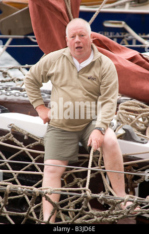 Sailor working on rigging on the Glaciere of Liverpool sailing ship at ...