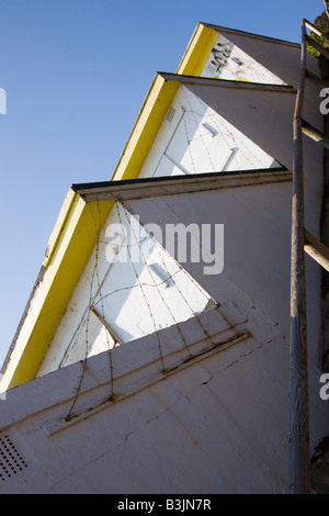 Beach huts facing the sea in Folkestone Kent Stock Photo