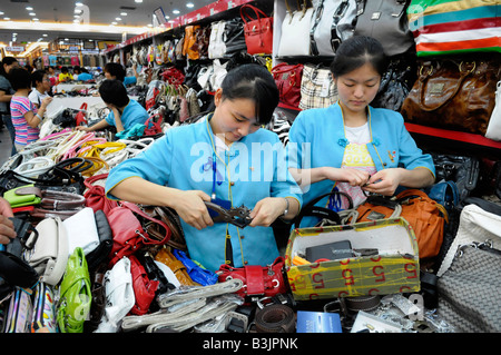 Sales ladies at the Hong Qiao Pearl Market in Beijing, China. Stock Photo