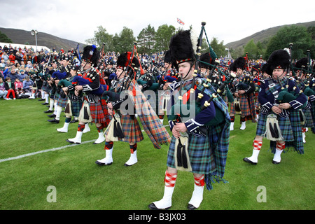 Crowds watching the massed bands at the famous Braemar Gathering and Games in Aberdeenshire, Scotland, UK Stock Photo