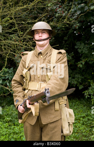 A member of a historical re-enactment society wears the uniforms of a ...