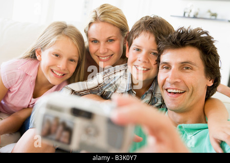 Family taking self portrait with digital camera Stock Photo