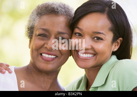 Two women outdoors smiling Stock Photo