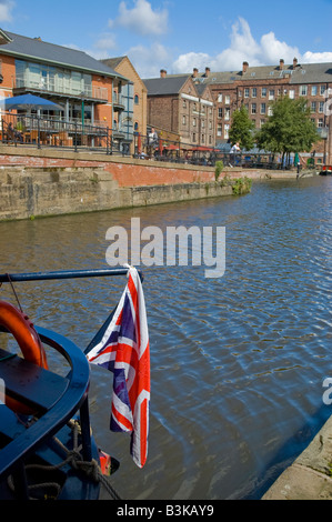 Union Jack flag flies on the stern of a barge on The Nottingham Canal, Nottingham, England. Stock Photo