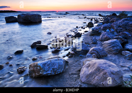 Sunset at the rocky shore of Georgian Bay Canada Awenda provincial park Stock Photo