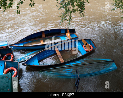 Sinking rowing boats Stock Photo