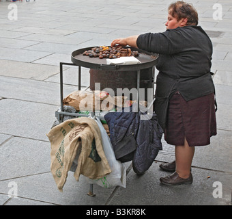 Midget grown sweet chestnut shop assistant in Turin Torino Piemont Italy No model release only for the editorial use no advertis Stock Photo