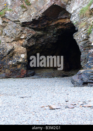 Mouth of a cave on the beach, Cornwall. Stock Photo