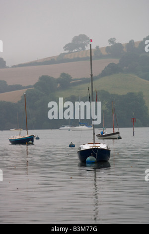 Boats moored on a river Stock Photo