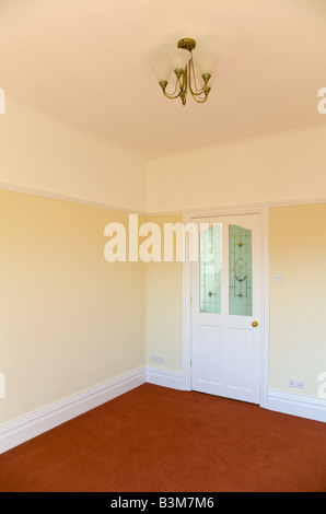 Empty room with half glazed door Stock Photo
