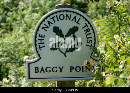 A national trust sign on the footpath at Baggy Point near Croyde in North Devon part of the South West coastal path Stock Photo