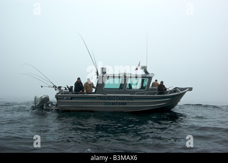 Aluminum sport fishing charter boat halibut fishing in rough seas and ...