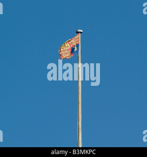 Royal Standard flag flying above Windsor Castle
