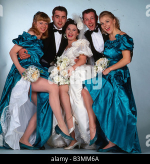 Scene from TV programme Take The High Road May 1991 group picture of best man groom bride and bridesmaids Stock Photo