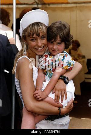 Five year old Kate Mills a Leukaemia sufferer with tv presenter Michaela Strachan from Wacaday childrens tv programme Stock Photo