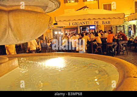 Italy Lazio Rome Campo dei Fiori is popular with bar and cafe patrons on a warm evening Stock Photo