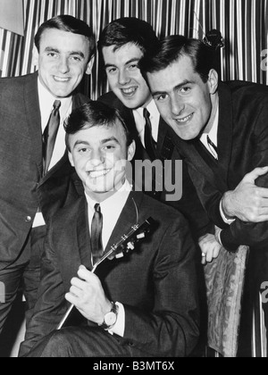 GERRY AND THE PACEMAKERS  UK pop group in 1964 with Gerry Marsden seated Stock Photo