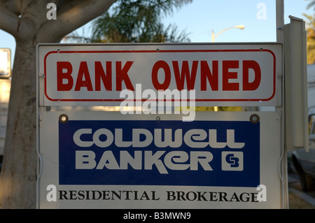 Bank Owned sign streets of Indio in Southern California foreclosed property Stock Photo