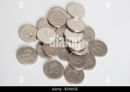 A pile of 5 pence pieces Stock Photo