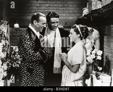 EASTER PARADE 1948 MGM film with from left Fred Astaire, Peter Lawford and Judy Garland Stock Photo