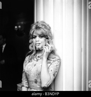 Brigitte Bardot actress smoking a cigarette upon arrival in London April 1959 Stock Photo