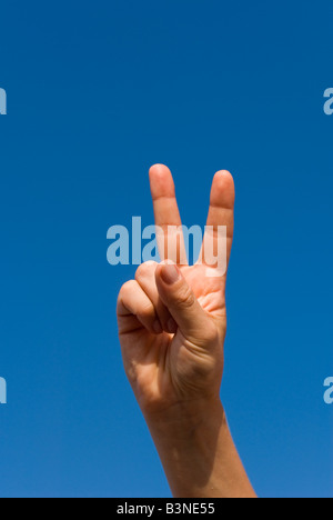 Model Released Detail of female forming a victory V sign Stock Photo