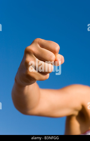 Model Released Detail of female forming a clenched fist Stock Photo