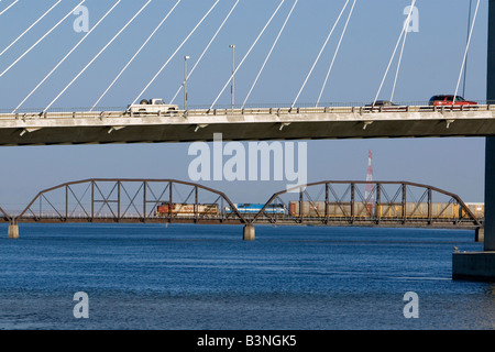 Automobiles travel across the Ed Hendler Bridge spanning the Columbia River between Pasco and Kennewick Washington Stock Photo