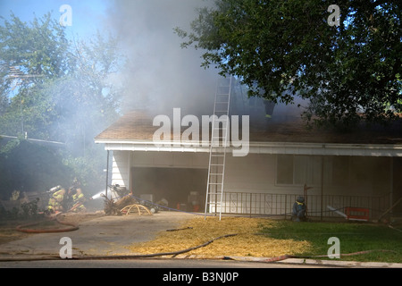 Firefighters respond to a house fire in Boise Idaho Stock Photo