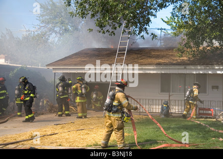 Firefighters respond to a house fire in Boise Idaho Stock Photo