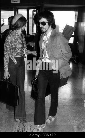 Former Beatles singer and guitarist George Harrison at London Airport May 1972 Stock Photo