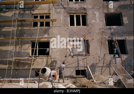 Mostar, june 1996', construction workers rebuilding residential houses, 1996 Stock Photo