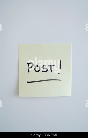 Adhesive note saying 'post' Stock Photo