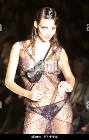 Christian Dior Collection at the Paris Fashion Show Feb 2000 A model presents this lace evening see through dress as part of British designer John Galliano s Autumn Winter 2000 ready to wear collection that he designed for French fashion house Dior Stock Photo