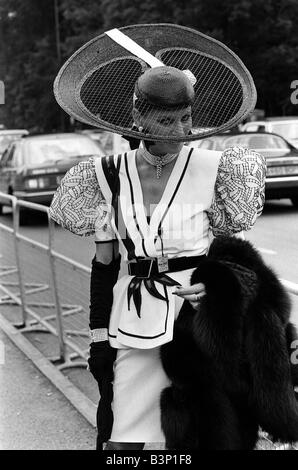 Fashion at Royal Ascot June 1987 Ladies Day A woman shows off her style of dress and hat Stock Photo