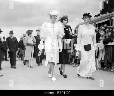 Fashion at Royal Ascot June 1935 Ladies Day women show off their style of dresses and hats Stock Photo