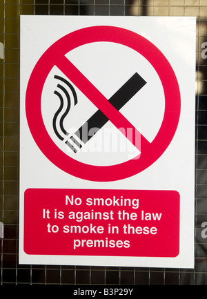 Close up of a no smoking sign, stuck to a glass door Stock Photo