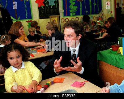 Tony Blair MP Prime Minister in the classroom during a visit to Sudbourne Primary School Brixton London May 1997 Stock Photo