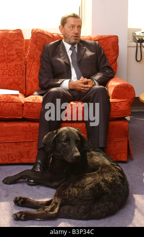David Blunkett MP interviewed by the Daily Mirror at the Home Office The interview was watched by Blunkett s new guide dog Sadie July 2003 Stock Photo