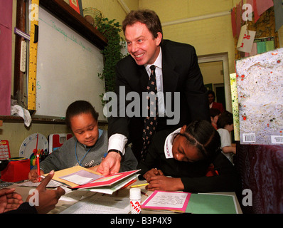 Tony Blair MP Prime Minister in the classroom during a visit to Sudbourne Primary School Brixton London 1997 Stock Photo