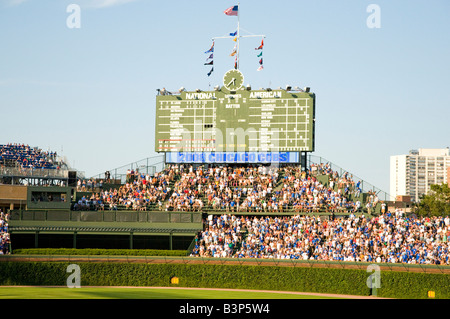 Chicago, Illinois - April 21, 2008: Famous Wrigley Field Scoreboard, Ivy  And Bleachers Before A Cubs Game Against The New York Mets Stock Photo,  Picture And Royalty Free Image. Image 7193095.