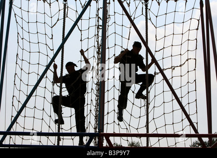 special troops soldiers pass maroon berets exam Stock Photo