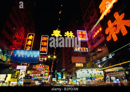 China, Hong Kong, Kowloon. The neon lightshow of Kowloon's main thoroughfare, Nathan Road, in Hong Kong. Stock Photo