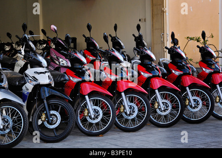 Motor bikes for sale, Kuta, Bali, Indonesia Stock Photo