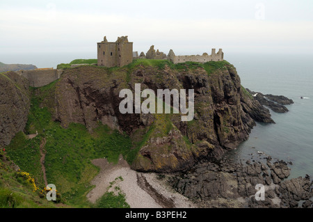 Dunnottar Castle, castle ruins in front of the panoramic view of the coastal cliffs of Stonehaven near Aberdeen, Scotland Stock Photo